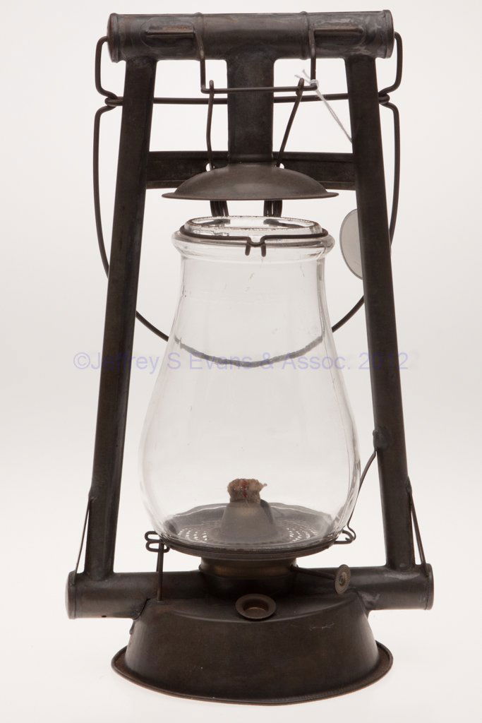 R. HERMANCE SHEET IRON HOT BLAST TUBULAR LANTERN: R. HERMANCE SHEET IRON HOT BLAST TUBULAR LANTERN, bail handle, upper horizontal tube impressed "PAT. AUG. 3.97", side-refill feature, colorless globe embossed "NO. 0. TUBULAR". Fitted with a brass bur