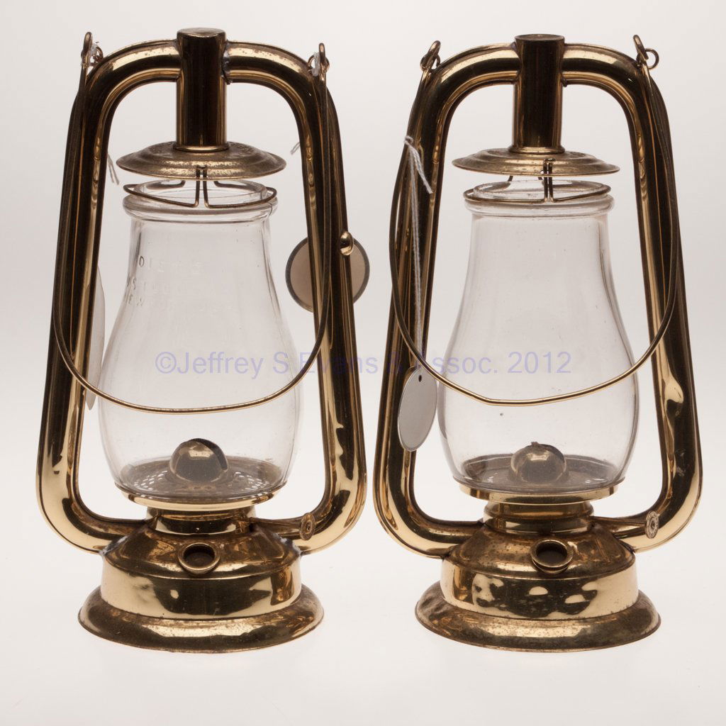 DIETZ "U. S." BRASS HOT BLAST TUBULAR LANTERNS, NE: DIETZ "U. S." BRASS HOT BLAST TUBULAR LANTERNS, NEAR PAIR, polished, bail handles, covers embossed "DIETZ * U.S. BRASS TUBULAR *" and other example "U. S. BRASS TUBULAR", side-refill features, undersi