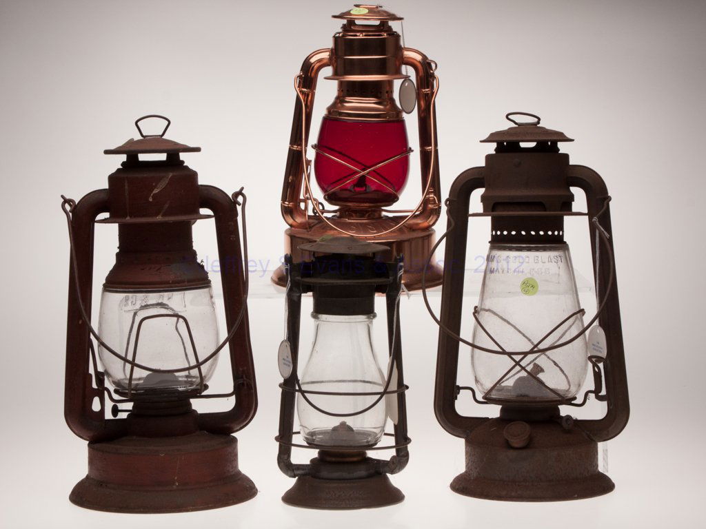 SHEET IRON COLD BLAST TUBULAR LANTERNS, LOT OF FOU: SHEET IRON COLD BLAST TUBULAR LANTERNS, LOT OF FOUR, each with a bail handle, three with colorless globes, comprising a C. T. Ham Manuf. Co.'s "No. 2", globe embossed "HAM'S COLD BLAST MATCHLESS"; a D