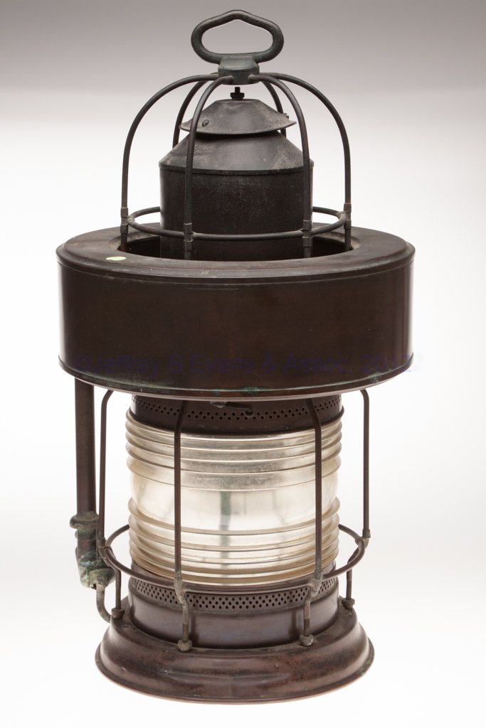 BRASS AND COPPER "POST LANTERN B" LIGHTHOUSE MARIN: BRASS AND COPPER "POST LANTERN B" LIGHTHOUSE MARINE LANTERN WITH OIL RESERVOIR, iron handle, brass tag marked "POST LANTERN B", removable oil reservoir tank, colorless 360 degree fresnel lens with wir