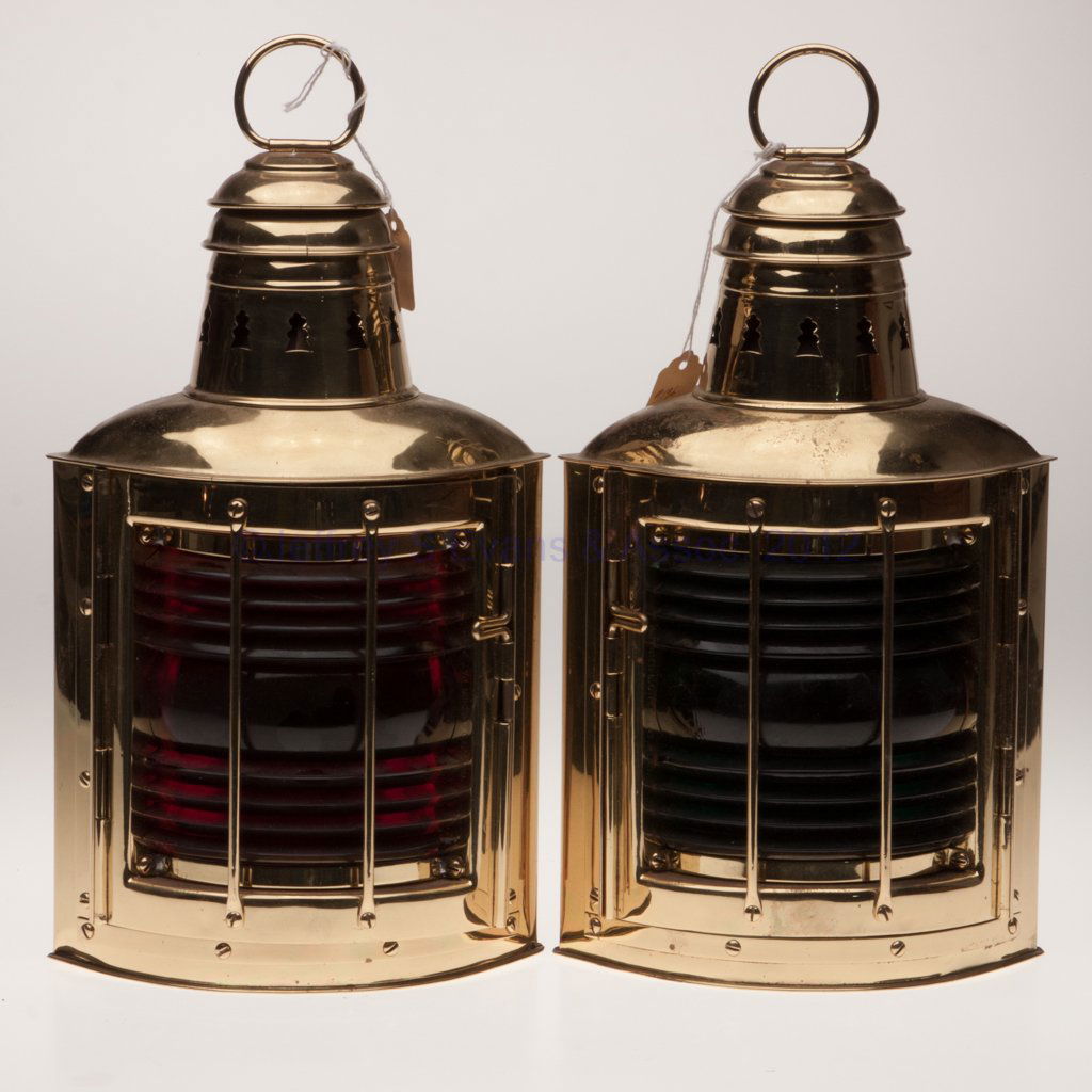 PERKINS M. L. CO. "PERKO DE-LITE" BRASS ELECTRIC P: PERKINS M. L. CO. "PERKO DE-LITE" BRASS ELECTRIC PORT AND STARBOARD MARINE LIGHTS, SET OF TWO, polished, ring handle, triangular form with two flat sides, one side fitted with mounting bracket and bra