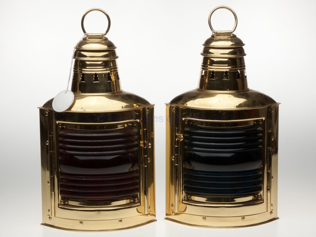 PERKINS "PERKO" BRASS SIDE MARINE LANTERNS, SET OF: PERKINS "PERKO" BRASS SIDE MARINE LANTERNS, SET OF TWO, polished, triangular form with ring handle and mounting bracket, each bracket marked "PERKINS MARINE LAMP & HARDWARE CORP / PERKO / BROOKLYN, N.