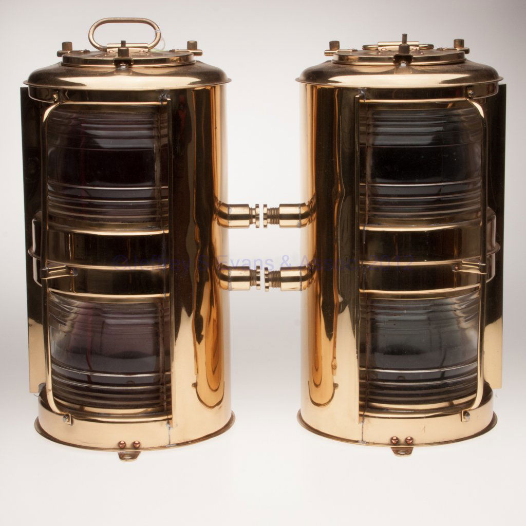 NIPPON SENTO CO. BRASS ELECTRIC PORT AND STARBOARD: NIPPON SENTO CO. BRASS ELECTRIC PORT AND STARBOARD MARINE LIGHTS, removable cover with handle and maker's brass plate with various markings, flat back with hanging bracket and a single tie-down ring t