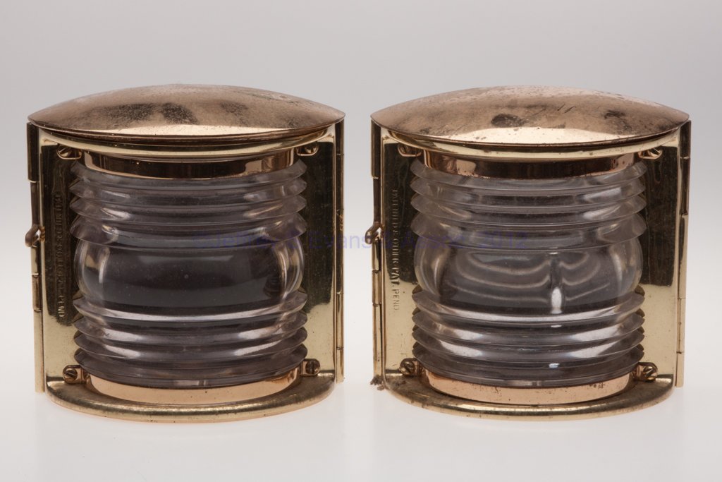 PERKINS "PERKO DE-LITE" BRASS ELECTRIC NAVIGATION : PERKINS "PERKO DE-LITE" BRASS ELECTRIC NAVIGATION MARINE LIGHTS, PAIR, polished, flat back with hinged door, lens frame marked "PATENTED & OTHER PAT. PEND", interior fitted with brass maker's plate ma