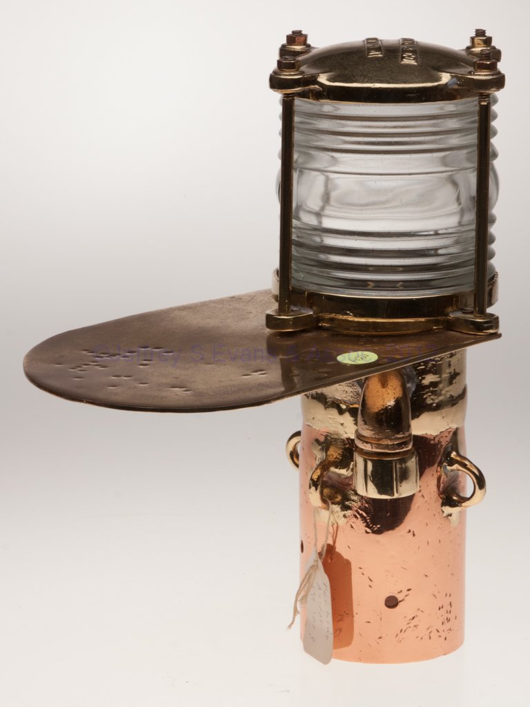 F. H. LOVELL & CO. CAST BRASS AND COPPER ELECTRIC : F. H. LOVELL & CO. CAST BRASS AND COPPER ELECTRIC POST-TYPE MARINE LIGHT, polished, top marked "F. H. LOVELL & CO / ARLINGTON N.J.", four tie-down rings, colorless 360 degree Perkins fresnel lens over