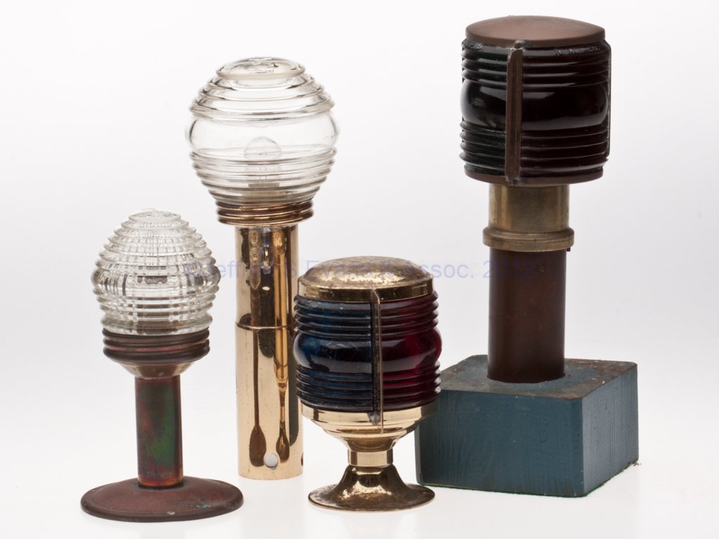 BRASS ELECTRIC BOAT NAVIGATION LIGHTS, LOT OF FOUR: BRASS ELECTRIC BOAT NAVIGATION LIGHTS, LOT OF FOUR, comprising a Perkins Perko and a National Marine Light Co running lights with red/ruby and green fresnel lens with divider; two examples with colorl