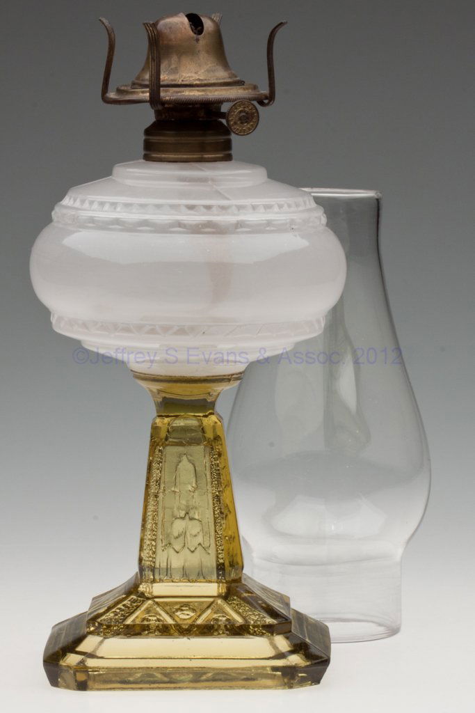 ATTERBURY STAR STAND LAMP: ATTERBURY STAR STAND LAMP, clambroth/alabaster font, amber base, No. 1 Taplin-Brown collar. Fitted with a period slip burner and chimney. Atterbury & Co. Fourth quarter 19th century. 8 1/2" H to top o