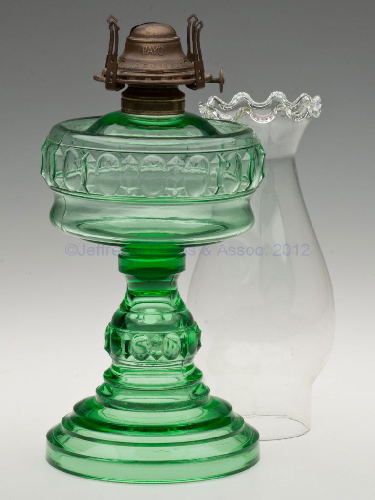 ANGELUS STAND LAMP: ANGELUS STAND LAMP, apple green, No. 1 Taplin-Brown collar. Fitted with a period slip burner and chimney with serrated scalloped top. Fourth quarter 19th century. 8 1/4" H top of collar, 4 5/8" D base