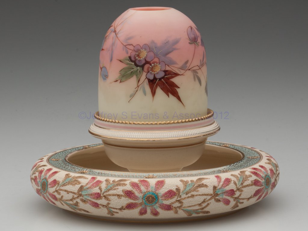 BURMESE AND CERAMIC THREE-PART FAIRY LAMP: BURMESE AND CERAMIC THREE-PART FAIRY LAMP, Webb plush finish shade with polychrome enamel "Hawthorne" decoration, ceramic base with Clarke's Patent interior markings and Taylor, Tunnicliffe & Co. mark