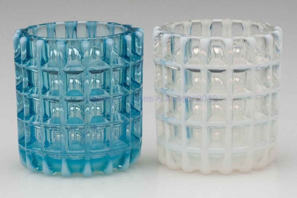 BEATTY HONEYCOMB TOOTHPICK HOLDERS, LOT OF TWO: BEATTY HONEYCOMB TOOTHPICK HOLDERS, LOT OF TWO, colorless and blue opalescent. Fourth quarter 19th century. 2 3/8" H. Provenance: From the collection of the late Marjorie Hulsebus, Redlands, CA.