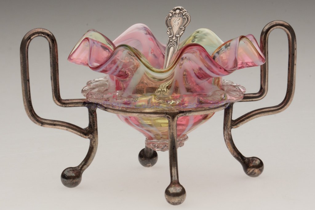 PELOTON DECORATED OPEN SALT: PELOTON DECORATED OPEN SALT, pink, yellow and opal with applied colorless rigaree and berry prunt, conical form, fitted in an "EPNS" stand with side handles and four feet, Gorham sterling silver spoon