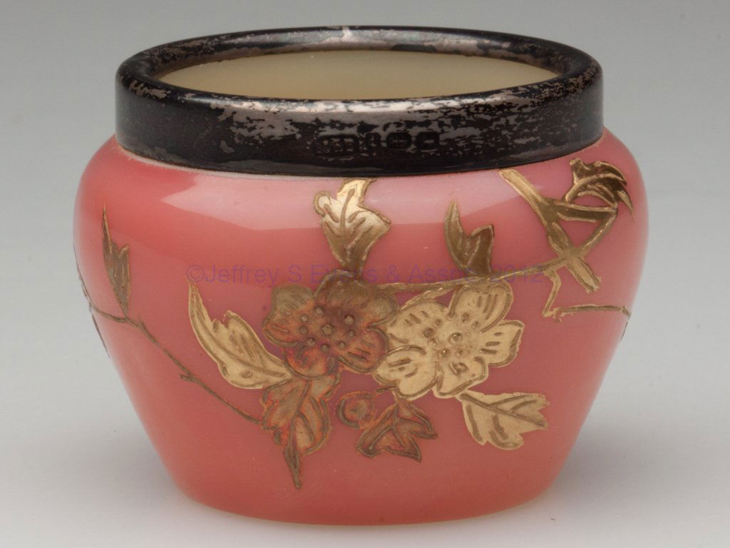 ENGLISH PEACHBLOW TYPE OPEN SALT: ENGLISH PEACHBLOW TYPE OPEN SALT, vaseline (uranium) cased interior, gilt prunus decoration, silver mounted rim marked for Hillard & Thomason, Birmingham, 1885. Possibly Thomas Webb & Sons, England. F