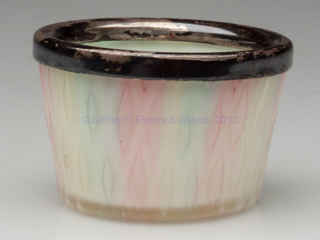 MOTHER-OF-PEARL RAINBOW SATIN OPEN SALT: MOTHER-OF-PEARL RAINBOW SATIN OPEN SALT, opal cased with diamond-type air traps, mounted silver-plate rim, polished pontil mark. Attributed to Thomas Webb & Sons, England. Fourth quarter 19th century.