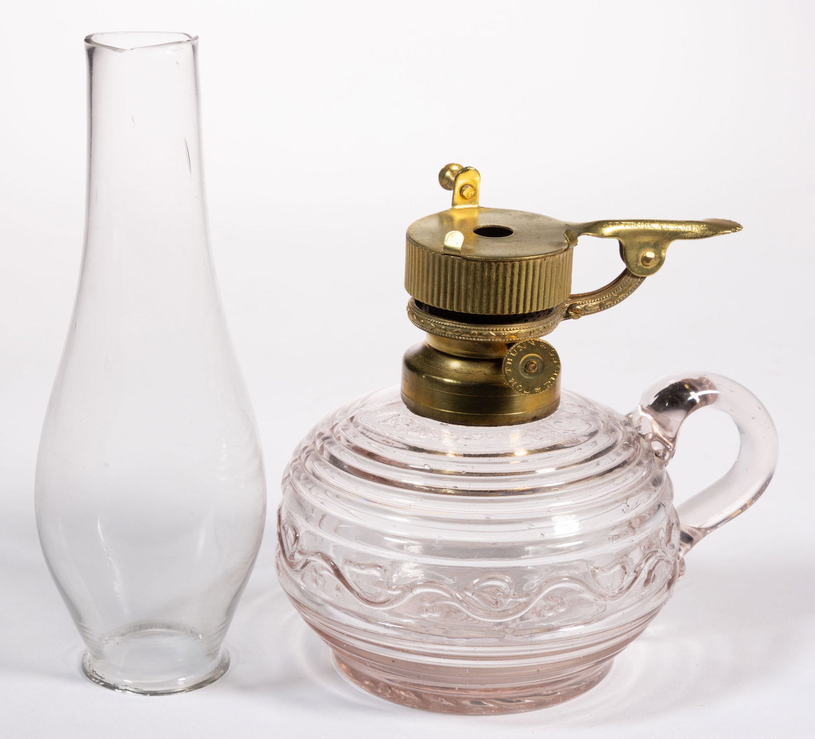 C. W. CAHOON "TOM THUMB DIRIGO" NO. 0 HINGED STRING-WICK LIP BURNER: C. W. CAHOON "TOM THUMB DIRIGO" NO. 0 HINGED STRING-WICK LIP BURNER, brass, thumbwheel marked "TOM THUMB / DIRIGO", and thumbrest marked "CHA'S W. CAHOON / PAT'D 