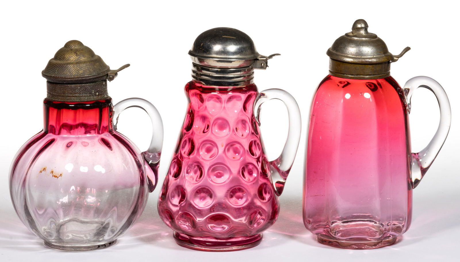 VICTORIAN SYRUP PITCHERS, LOT OF THREE (1 of 1)