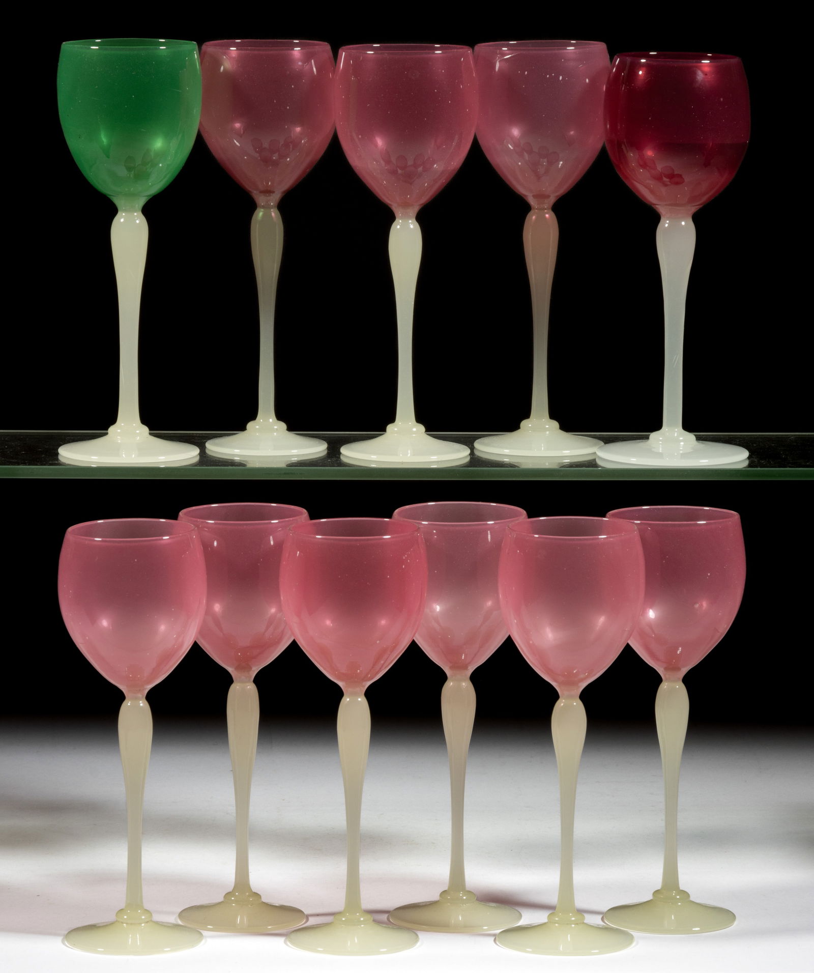 ASSORTED ALABASTER ART GLASS WINE GLASSES, LOT OF 11: ASSORTED ALABASTER ART GLASS WINE GLASSES, LOT OF 11, ten with Rosaline bowls and one with Jade bowl, each with an inverted teardrop stem. Possibly Stevens & Williams, Stourbridge, England. First