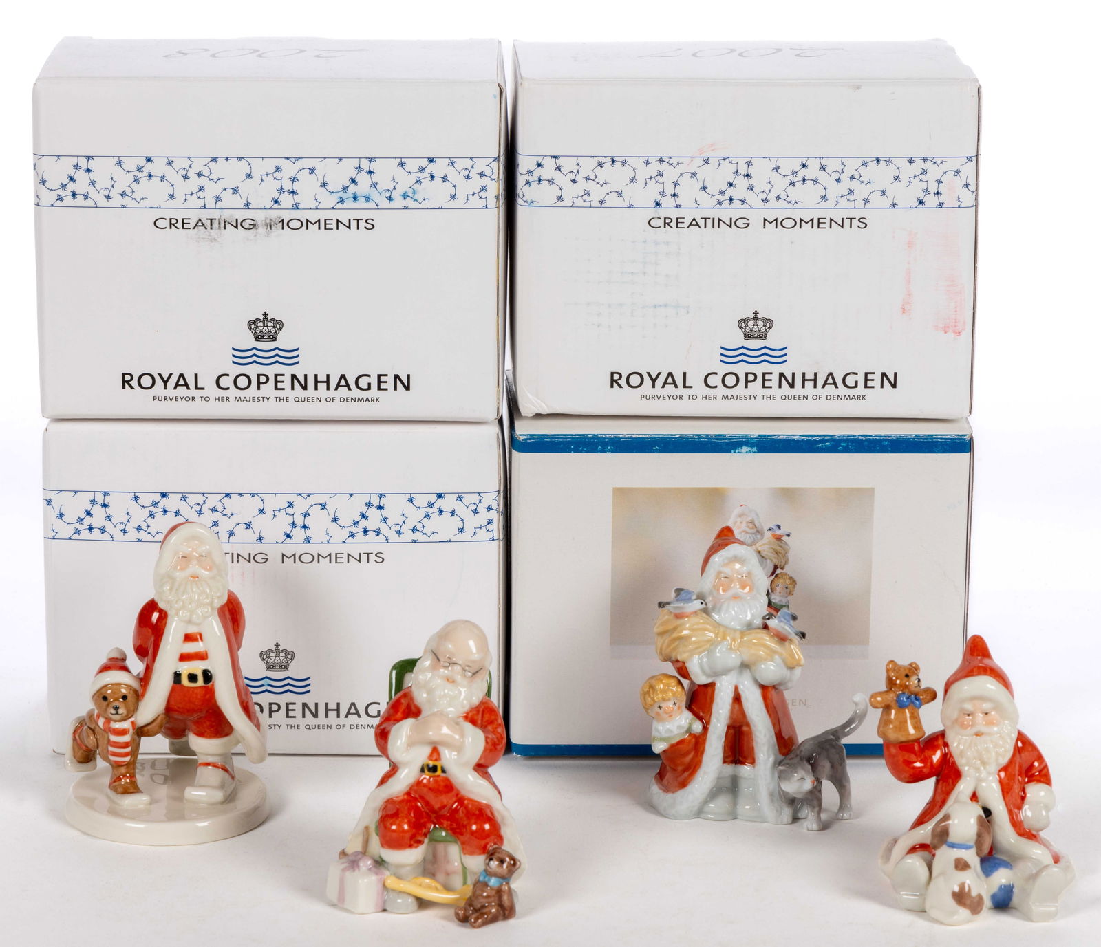 DANISH ROYAL COPENHAGEN PORCELAIN ANNUAL SANTA FIGURES, LOT OF FOUR (1 of 1)
