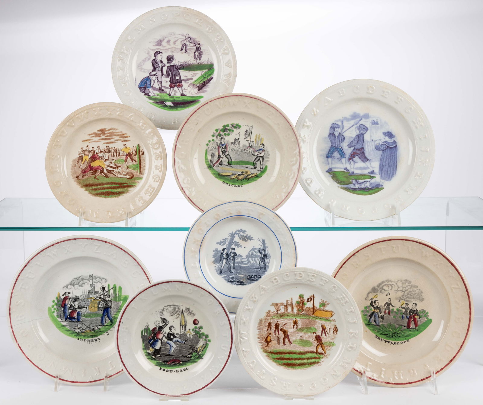 BRITISH TRANSFER-PRINTED CERAMIC SPORTS MOTIF CHILDREN'S ABC PLATES, LOT OF NINE (1 of 1)