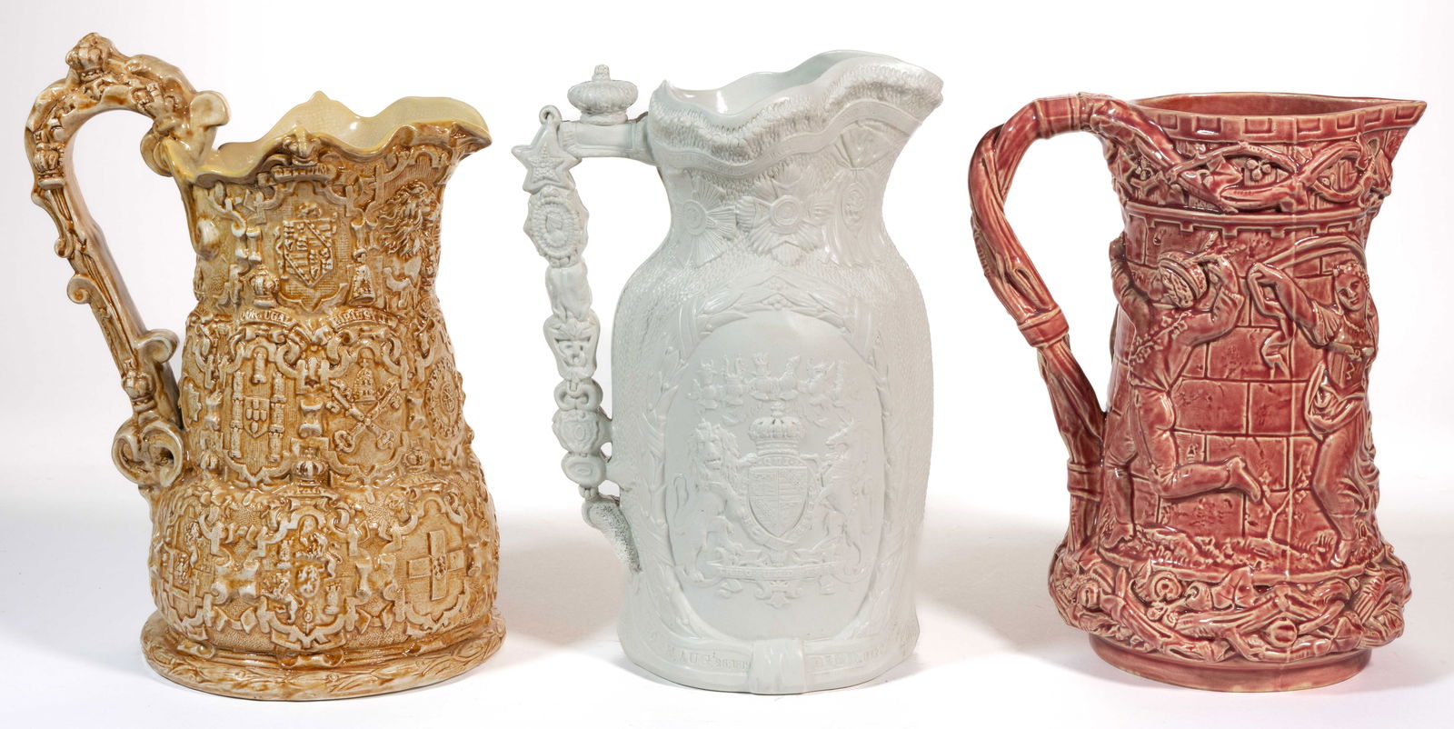 ENGLISH RELIEF-MOLDED CERAMIC JUGS / PITCHERS, LOT OF THREE (1 of 2)