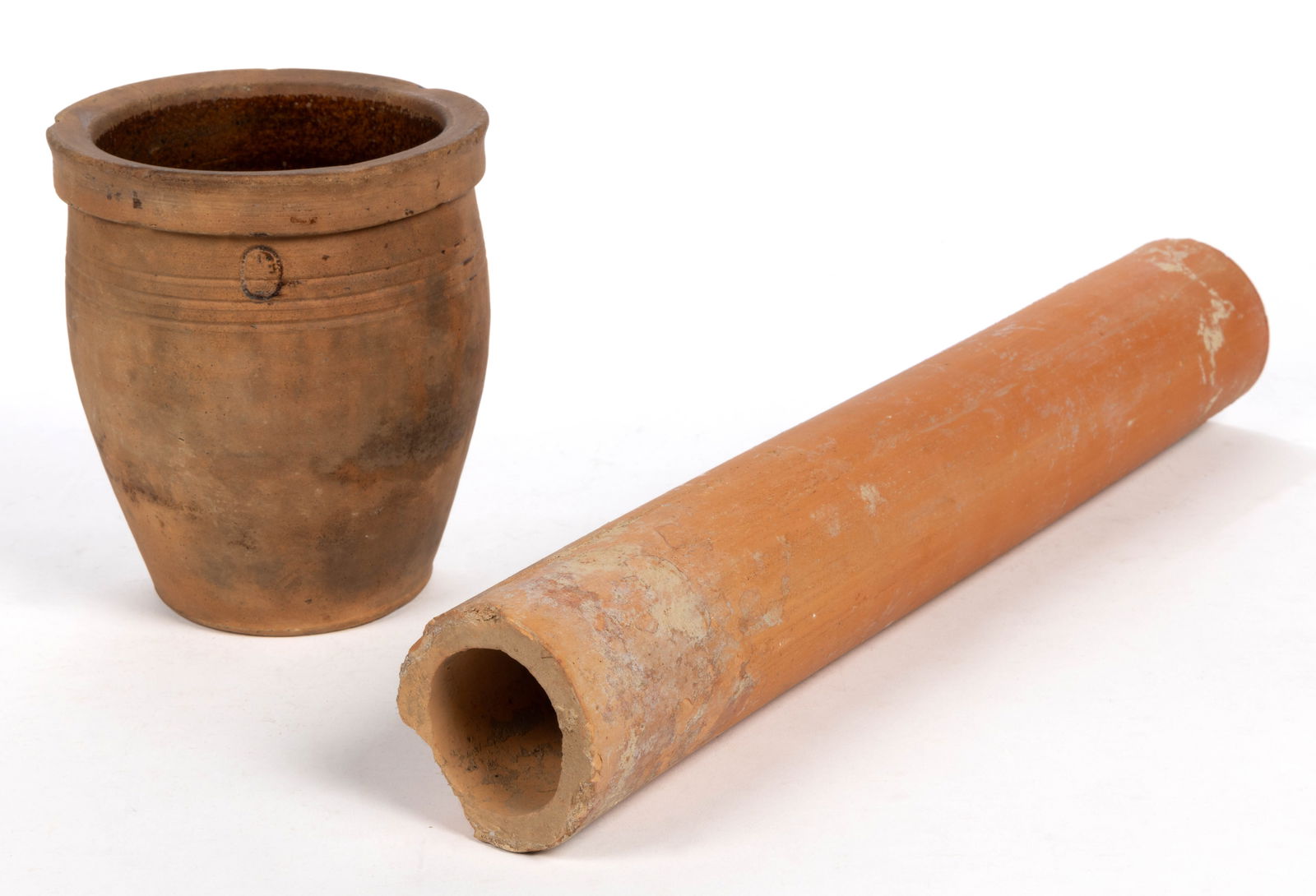 EMANUEL SUTER ATTRIBUTED, ROCKINGHAM CO., SHENANDOAH VALLEY OF VIRGINIA EARTHENWARE / REDWARE: EMANUEL SUTER ATTRIBUTED, ROCKINGHAM CO., SHENANDOAH VALLEY OF VIRGINIA EARTHENWARE / REDWARE ARTICLES, LOT OF TWO, comprising a stamped "1/2" gallon capacity mark wide-mouth crock with lead