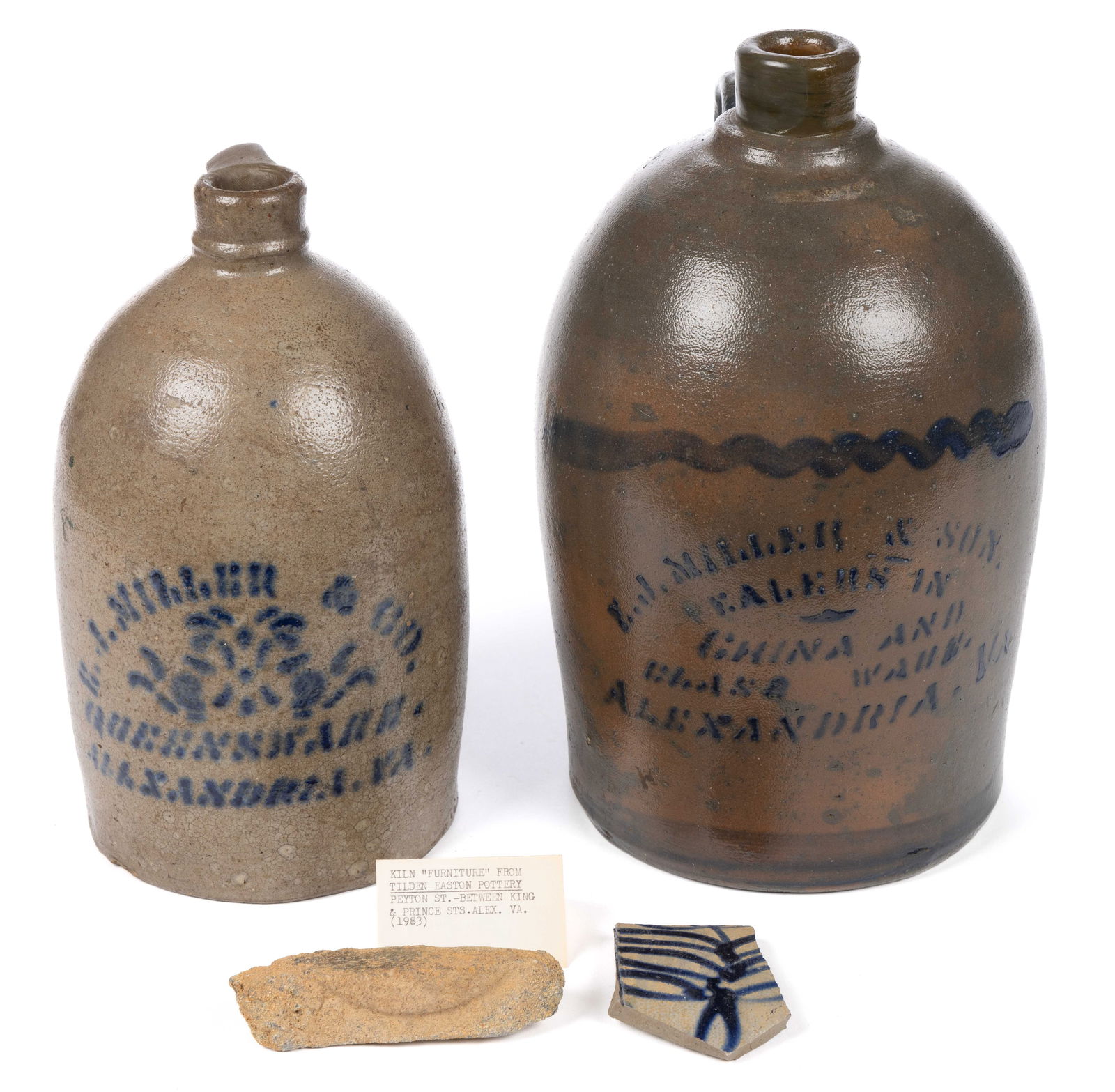 VIRGINIA MERCHANT'S STENCILED STONEWARE JUGS, LOT OF TWO: VIRGINIA MERCHANT'S STENCILED STONEWARE JUGS, LOT OF TWO, salt-glazed, each of beehive form with applied strap handle, comprising an approximately half-gallon capacity example and an approximately