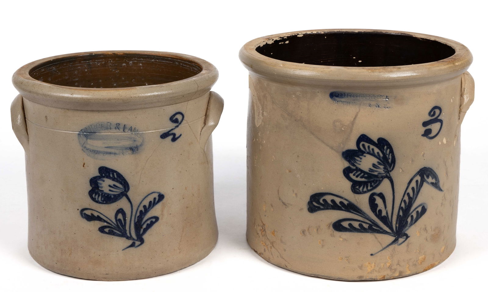 BURGER FAMILY, ROCHESTER, NEW YORK DECORATED STONEWARE CROCKS, LOT OF TWO: BURGER FAMILY, ROCHESTER, NEW YORK DECORATED STONEWARE CROCKS, LOT OF TWO, salt-glazed, comprising one designated two-gallon capacity and stamped "BURGER & LANG / ROCHESTER N.Y" and