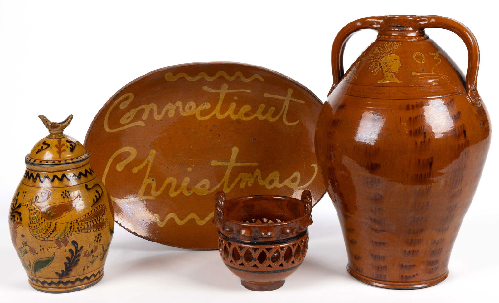 SIGNED GREG SHOONER, OREGONIA, OHIO EARTHENWARE / REDWARE ARTICLES, LOT OF FOUR: SIGNED GREG SHOONER, OREGONIA, OHIO EARTHENWARE / REDWARE ARTICLES, LOT OF FOUR, lead-glazed, comprising an ovoid-form jug with double-strap handles featuring yellow slip-trailed decorations incl