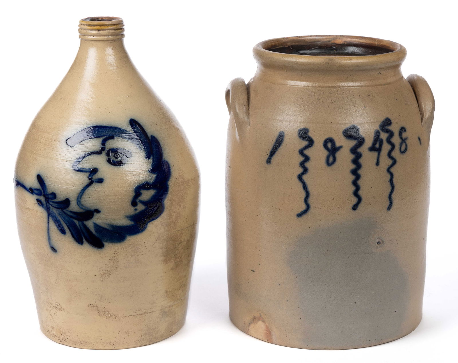 AMERICAN DECORATED STONEWARE ARTICLES, LOT OF TWO: AMERICAN DECORATED STONEWARE ARTICLES, LOT OF TWO, salt-glazed, comprising an approximately one-gallon capacity jug with ringed mouth and a "1 1/2" gallon capacity jar with applied arch
