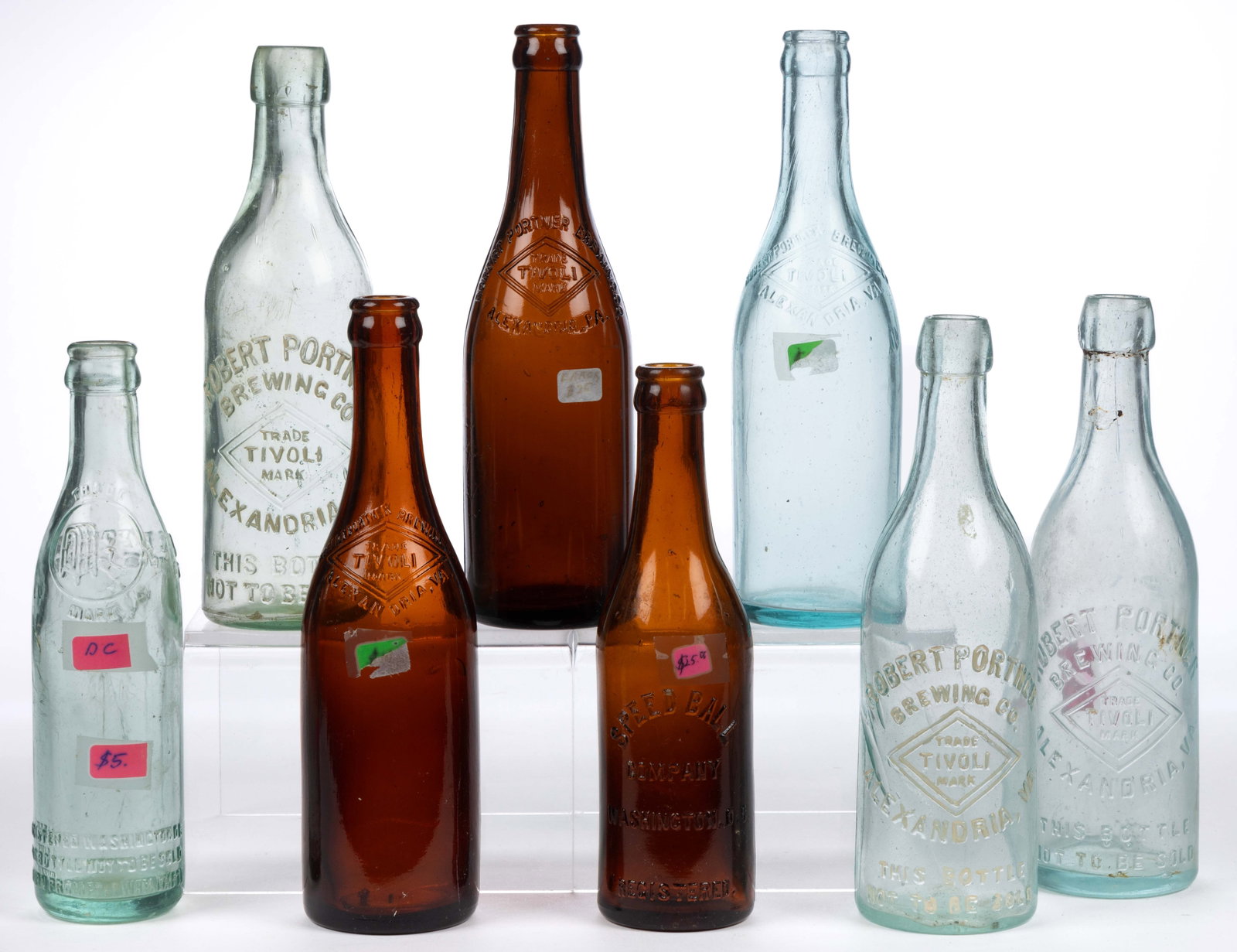 ROBERT PORTNER BREWING CO., ALEXANDRIA VIRGINIA BEER BOTTLES, LOT OF SIX: ROBERT PORTNER BREWING CO., ALEXANDRIA VIRGINIA BEER BOTTLES, LOT OF SIX, amber and aqua, each embossed with "TIVOLI" inside Portner's diamond trademark, comprising three 