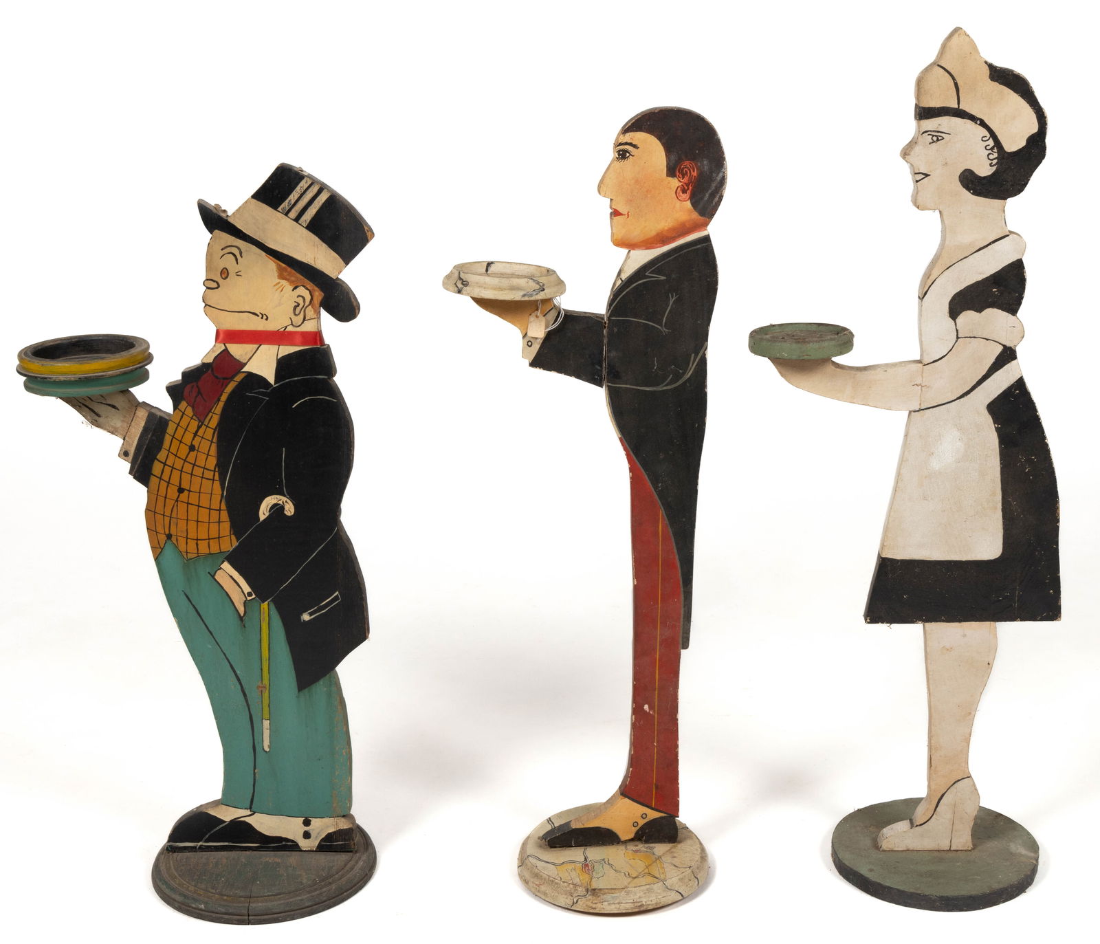 AMERICAN FOLK ART FIGURAL SMOKING STANDS, LOT OF THREE: AMERICAN FOLK ART FIGURAL SMOKING STANDS, LOT OF THREE, cut-out wood with original paint decorations, depicting Jiggs comic character, a nurse, and a butler. Circa 1930. 37" HOA, 9"