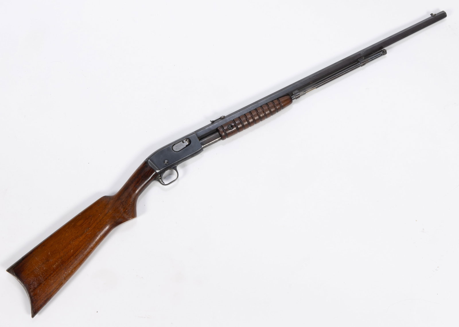 REMINGTON MODEL 12 .22-CALIBER RIFLE: REMINGTON MODEL 12 .22-CALIBER RIFLE, pump action, octagonal barrel. Serial number 726661. 1927. 40 1/2" LOA. Class: Curio. FIREARMS LAWS. All firearms are sold in accordance with 