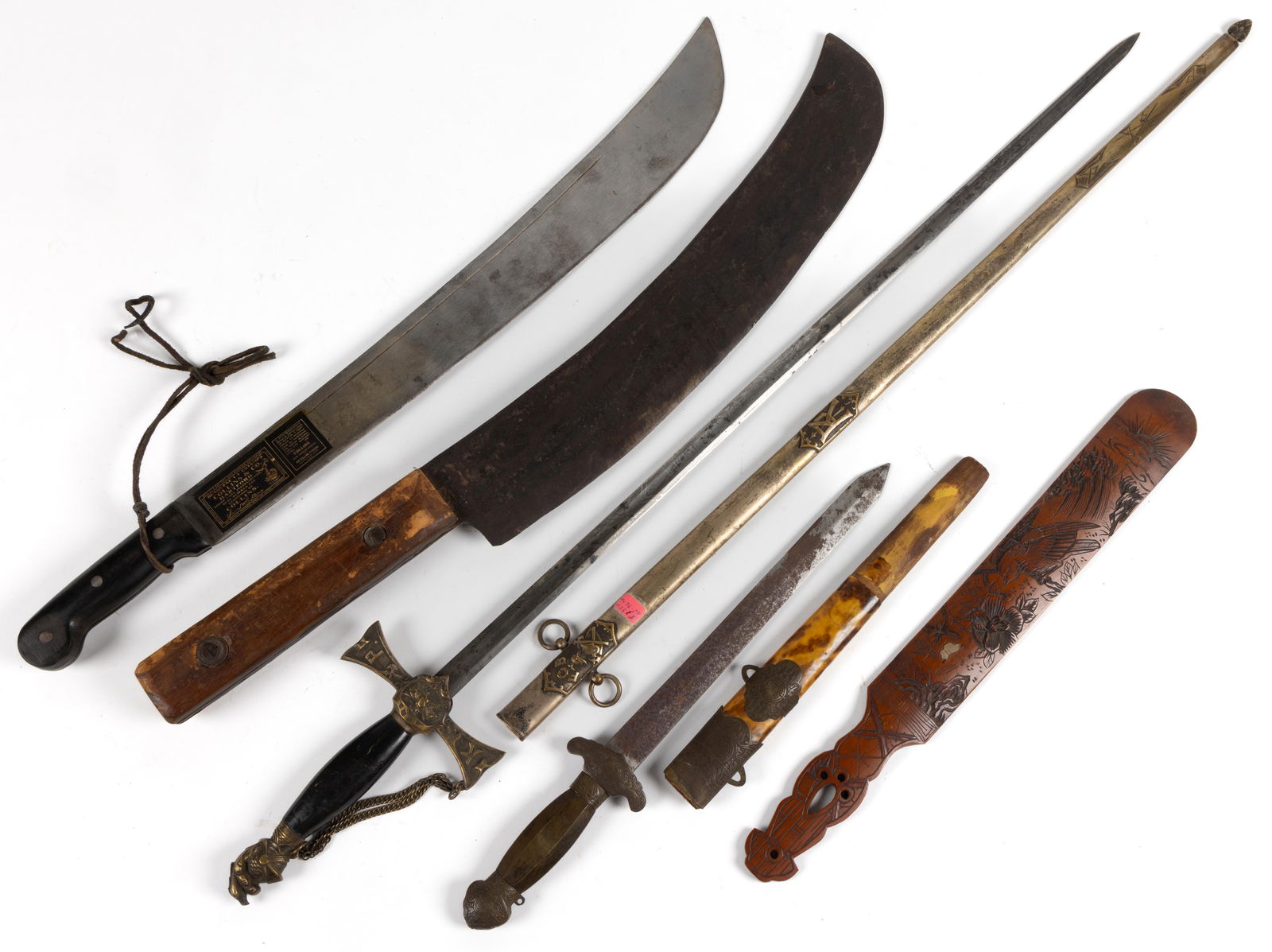 ASSORTED KNIVES AND SWORDS, LOT OF FOUR: ASSORTED KNIVES AND SWORDS, LOT OF FOUR, comprising a machete marked by Legitimus Collins and Co; an unmarked machete with very thick blade; a presentation sword from the Knights of Pythias; and an As