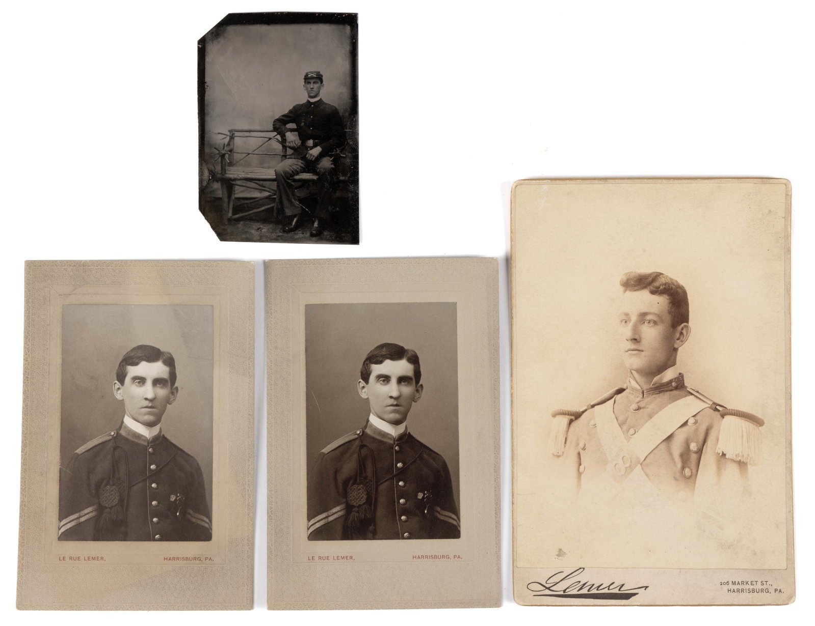 PENNSYLVANIA MILITARY PHOTOGRAPHS, LOT OF FOUR: PENNSYLVANIA MILITARY PHOTOGRAPHS, LOT OF FOUR, comprising a sixth-plate tintype image of a National Guard soldier in full uniform with kepi and M1874 NGP belt plate, seated on a bench; a cabinet phot
