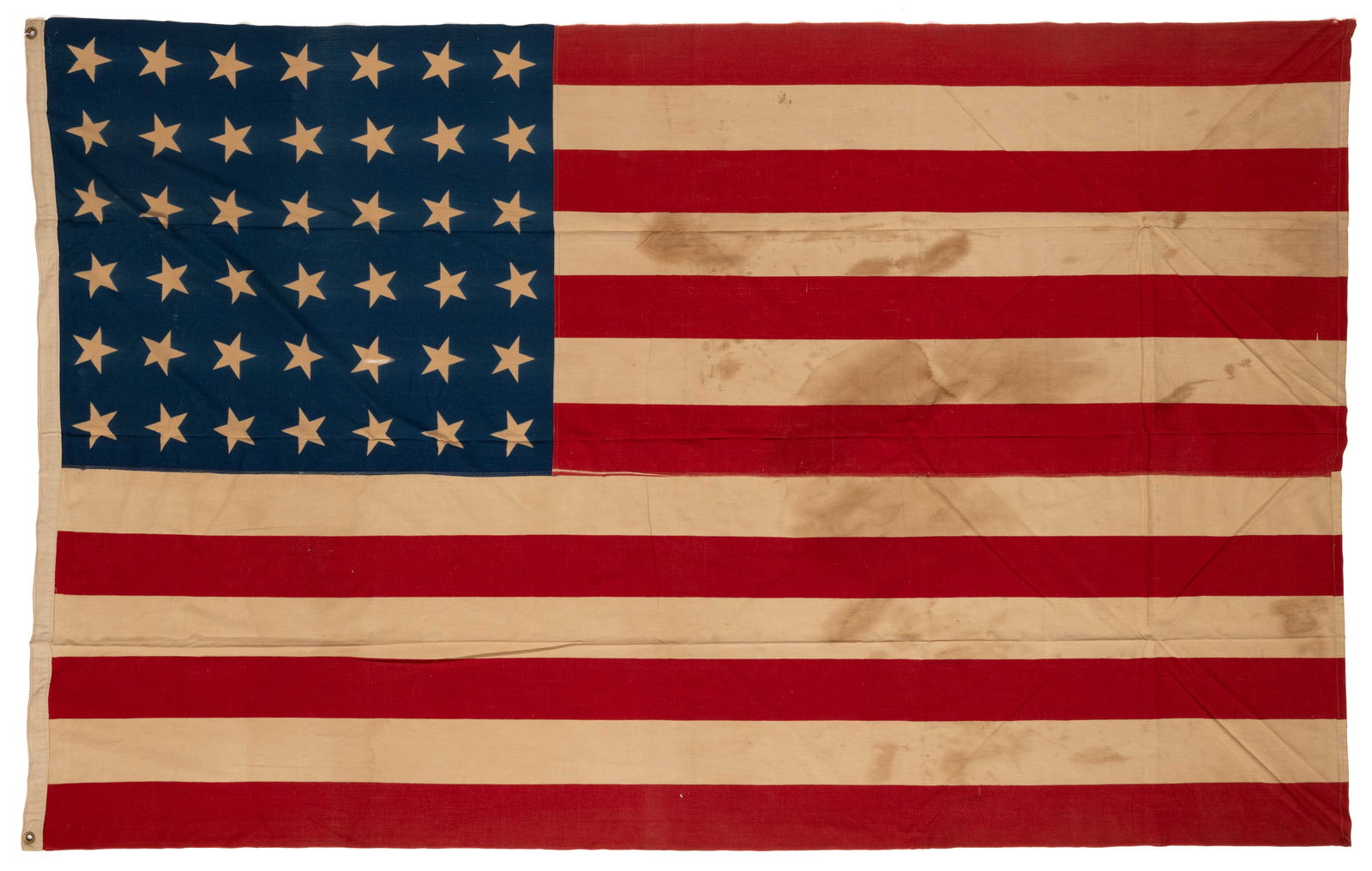 42-STAR AMERICAN NATIONAL WASHINGTON STATEHOOD PRINTED FLAG: 42-STAR AMERICAN NATIONAL WASHINGTON STATEHOOD PRINTED FLAG, cotton linen, large format, the canton featuring six rows each comprising seven stars. Unframed. Circa 1890. 58" x 91 1/2" OA. Pr