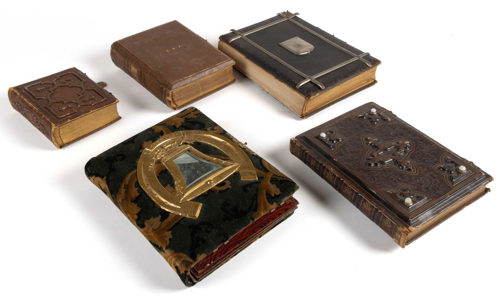 ANTIQUE PHOTOGRAPH ALBUMS, LOT OF FIVE: ANTIQUE PHOTOGRAPH ALBUMS, LOT OF FIVE, leather and fabric covers, with some photographs included, mainly CDVs. Fourth quarter 19th century. 11 1/2" x 9" OA. Provenance: