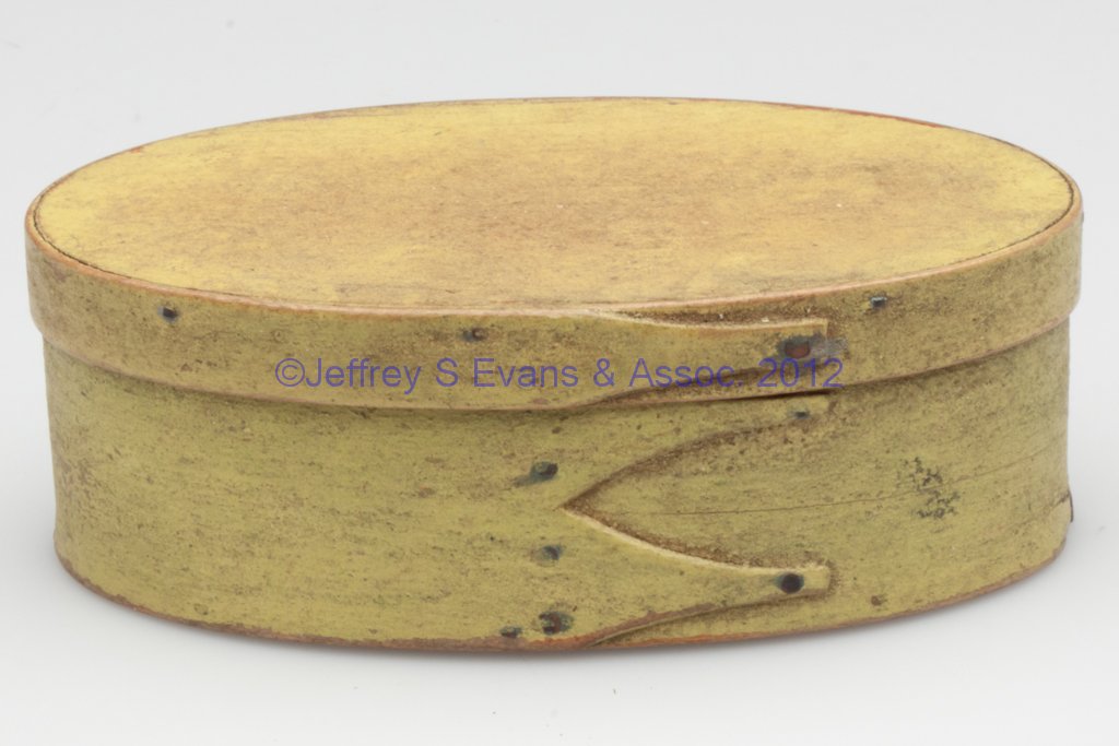 SHAKER THREE-FINGER PAINTED BENTWOOD DIMINUTIVE OV: SHAKER THREE-FINGER PAINTED BENTWOOD DIMINUTIVE OVAL BOX, copper tacks and pins. Bright chrome-yellow painted surface. Second half 19th century. 1 5/8" H, 2 7/8" x 4 3/4".