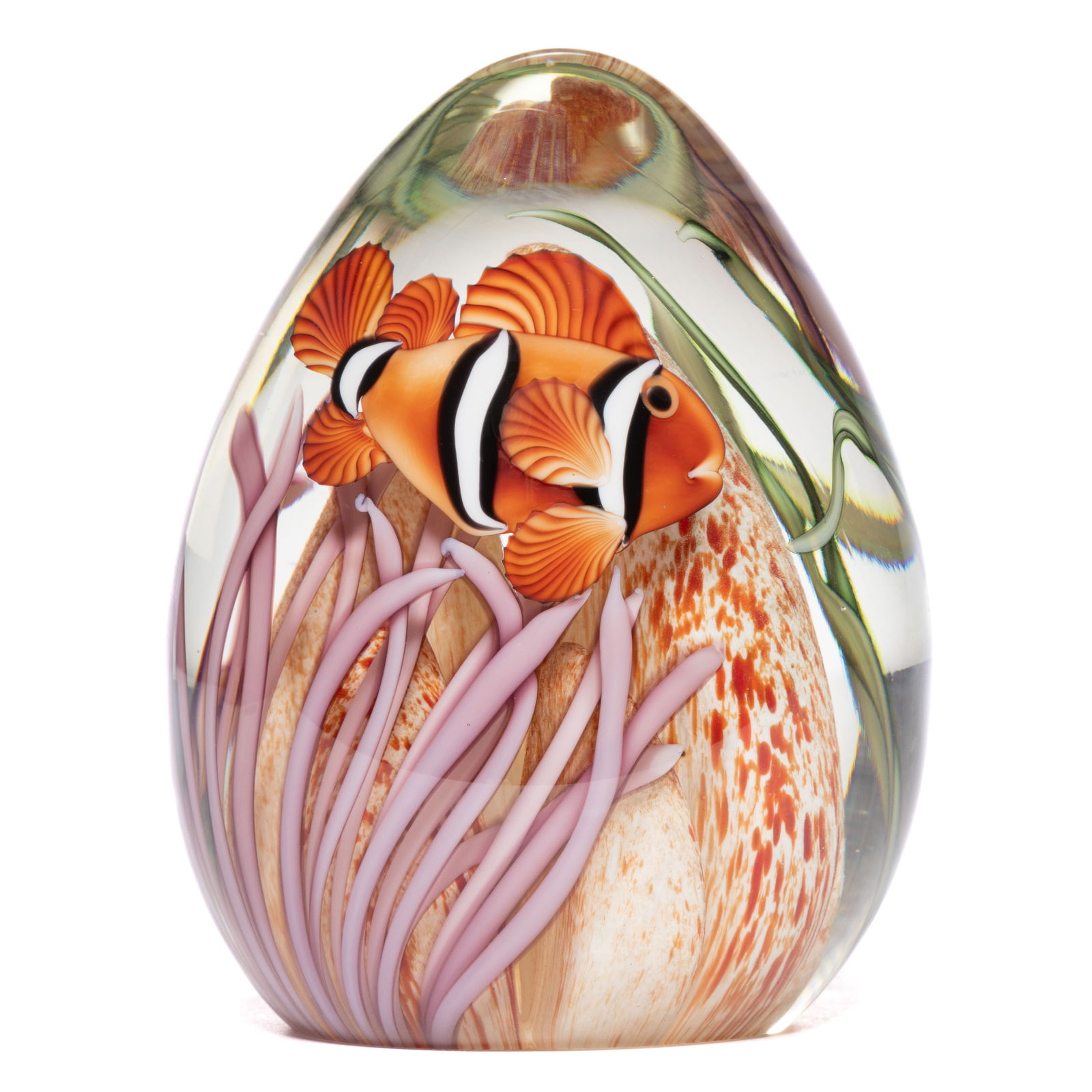 BRUCE SILLARS (AMERICAN, B. 1951) CLOWNFISH IN CORAL LAMPWORK STUDIO ART GLASS EGG FORM PAPERWEIGHT: BRUCE SILLARS (AMERICAN, B. 1951) CLOWNFISH IN CORAL LAMPWORK STUDIO ART GLASS EGG FORM PAPERWEIGHT, a single orange, white, and black clownfish swimming in many light purple coral tendrils, with five