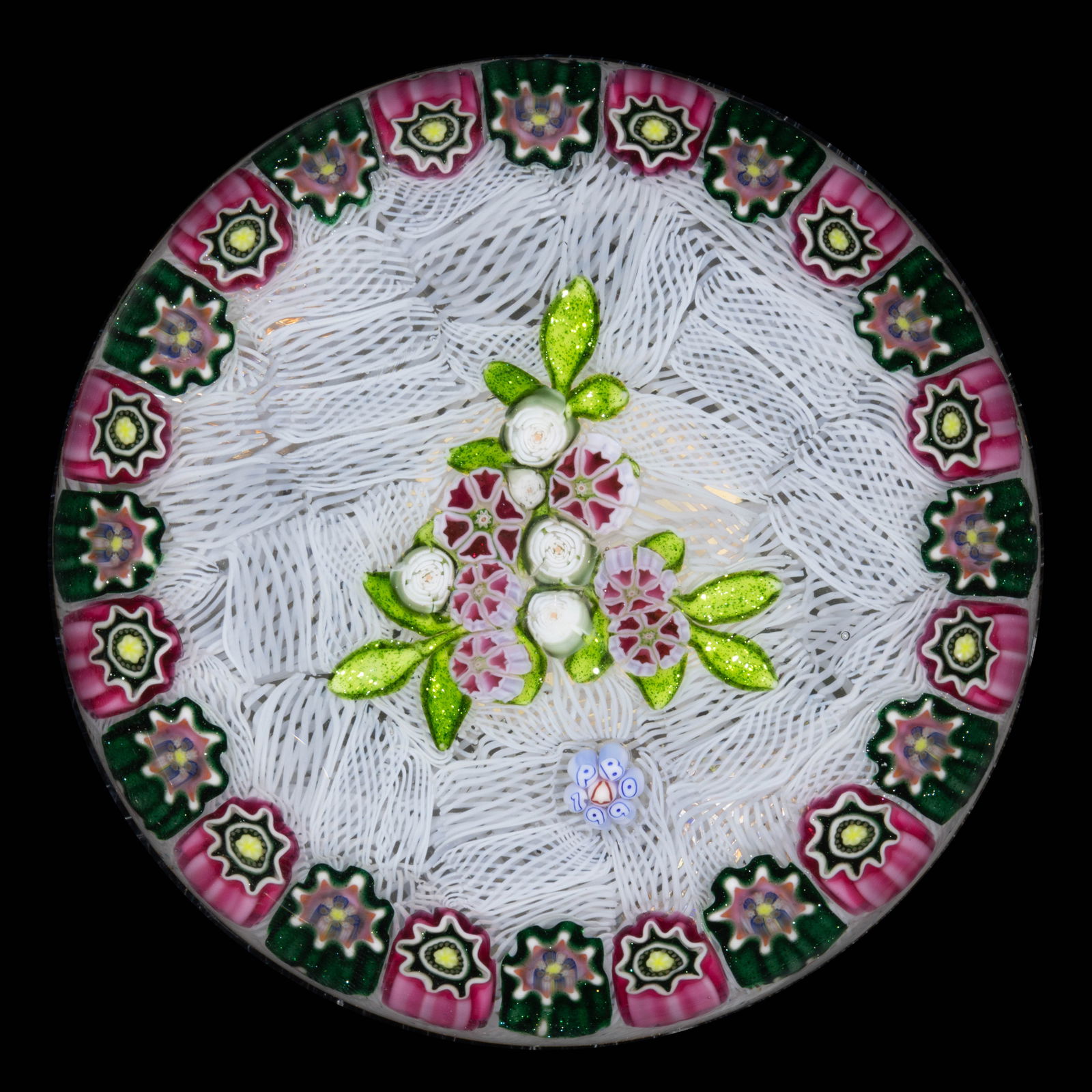 PARABELLE FLORAL BOUQUET MILLEFIORI STUDIO ART GLASS PAPERWEIGHT: PARABELLE FLORAL BOUQUET MILLEFIORI STUDIO ART GLASS PAPERWEIGHT, central bouquet comprised of white and fuchsia bellflower canes and white and green Clichy-type rose canes with many protruding a