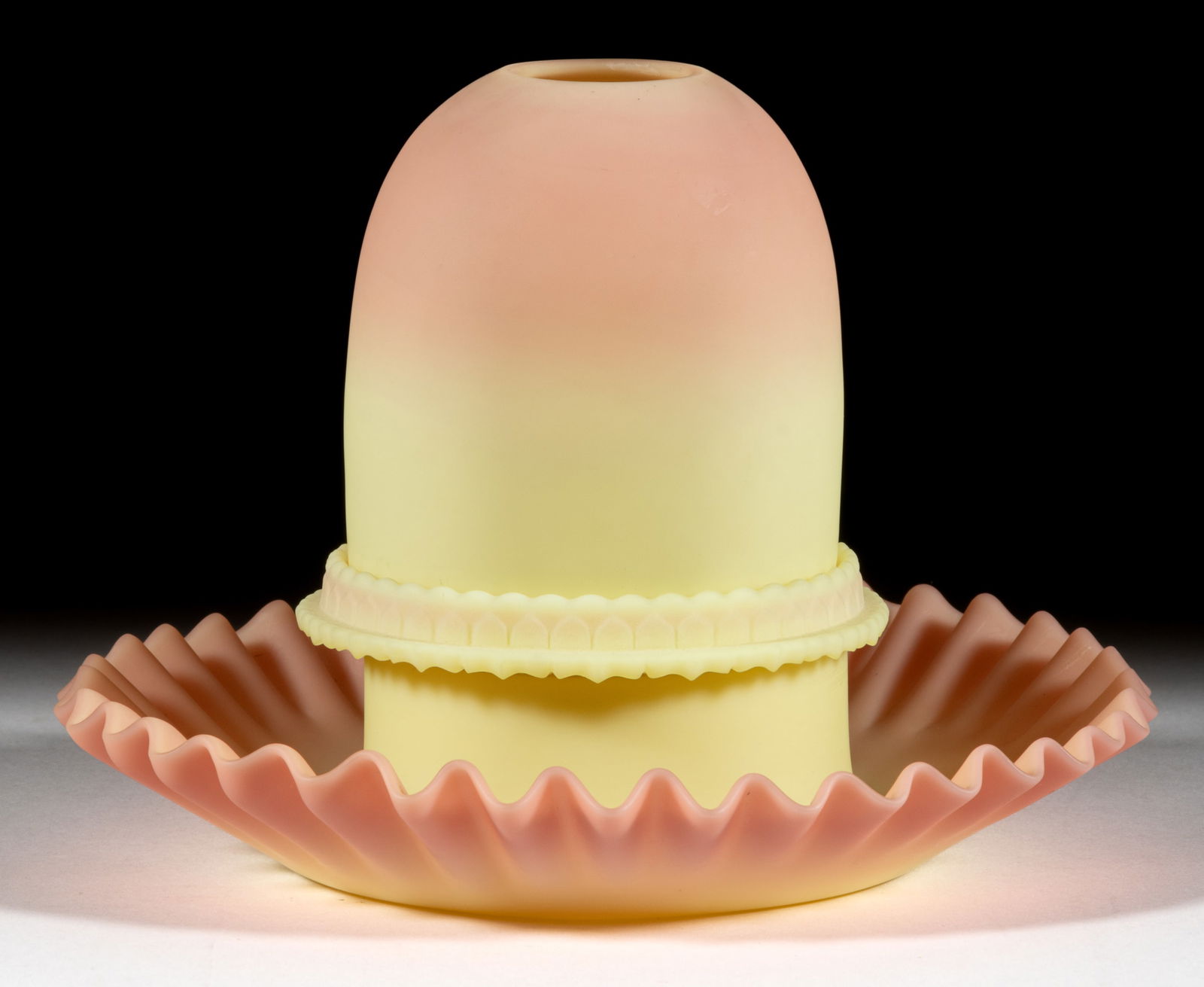 THOMAS WEBB BURMESE GLASS FAIRY LAMP: THOMAS WEBB BURMESE GLASS FAIRY LAMP, plush finish, fairy-size dome, three-part construction comprising the dome fitted on a Burmese Fenton ribbed patterned candle lamp base embossed with ma