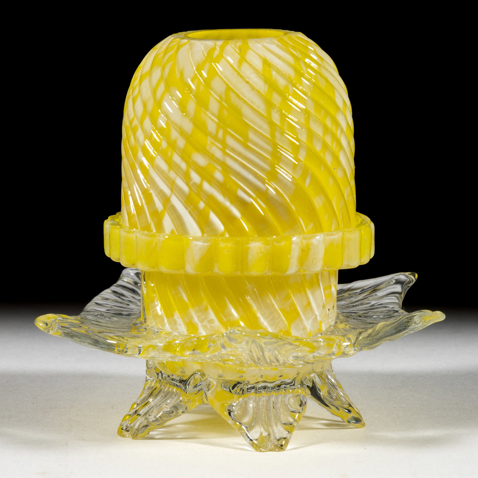RIBBED SWIRL AND SPATTER ART GLASS FAIRY LAMP: RIBBED SWIRL AND SPATTER ART GLASS FAIRY LAMP, cased lemon yellow with opal spatter, pyramid-size dome with as-made wide ground air vents to the fitter, two-part construction comprising the dome fitte