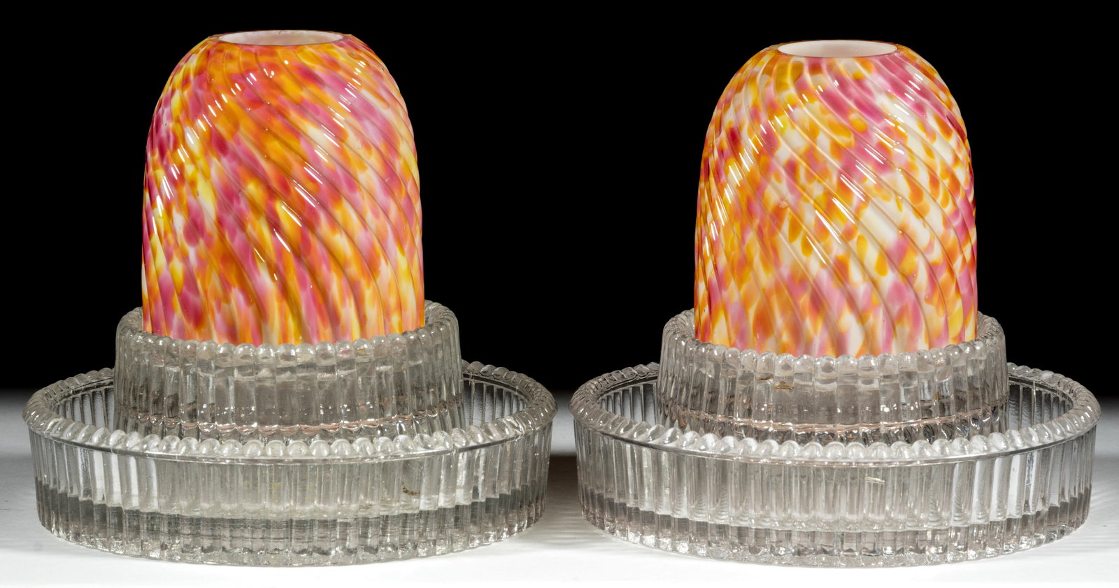 RIBBED SWIRL AND SPATTER / END-OF-THE-DAY FAIRY LAMPS, PAIR: RIBBED SWIRL AND SPATTER / END-OF-DAY FAIRY LAMPS, PAIR, opal cased with rose and yellow flakes, fairy-size domes, two-part construction comprising the dome fitted on a colorless double-tier
