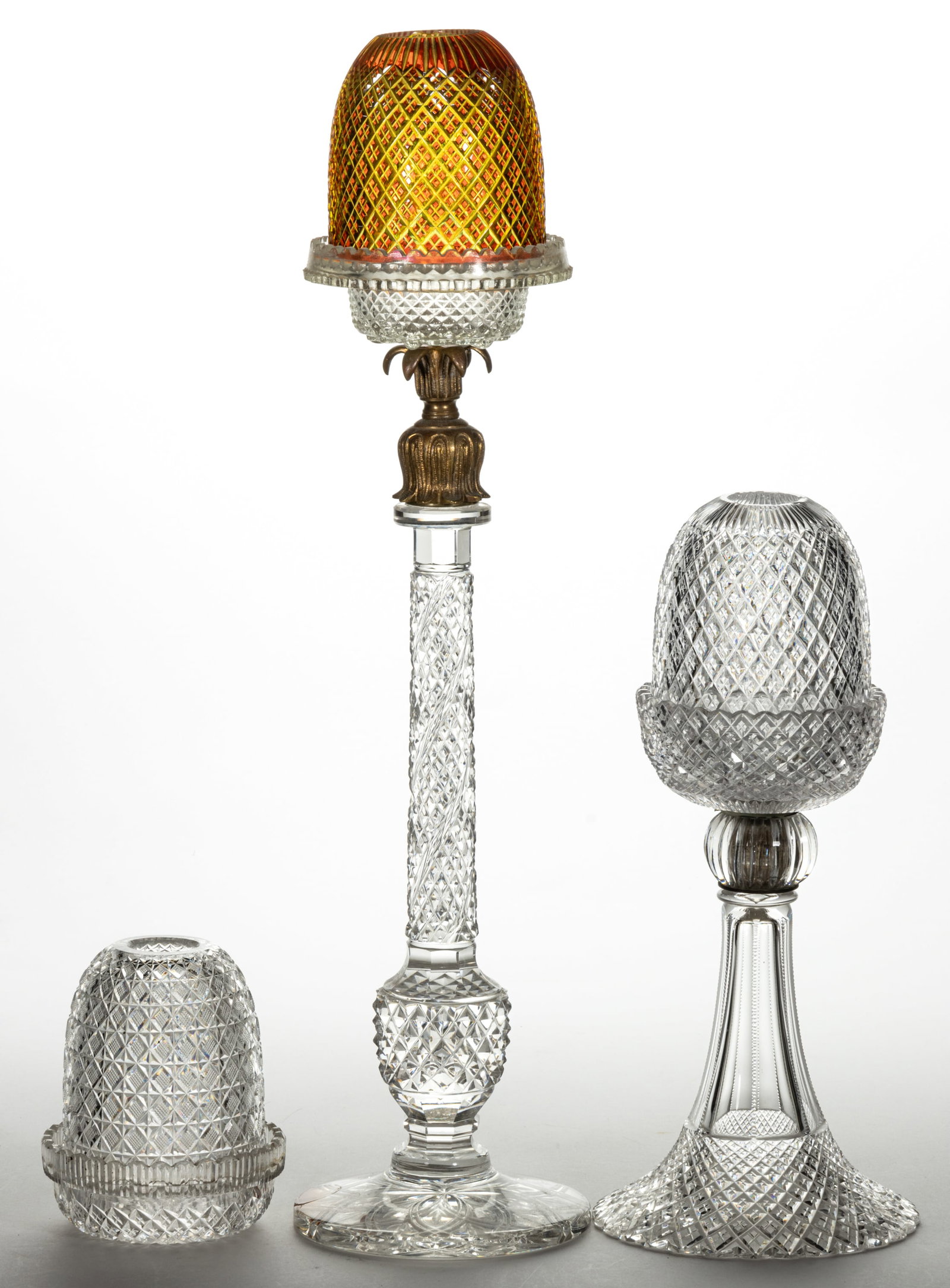 ASSORTED ENGLISH DIAMOND PATTERNED CUT GLASS FAIRY LAMPS, LOT OF THREE: ASSORTED ENGLISH DIAMOND PATTERNED CUT GLASS FAIRY LAMPS, LOT OF THREE, each with a fairy-size dome, comprising two colorless examples, including multi-part constructed pedestal example with