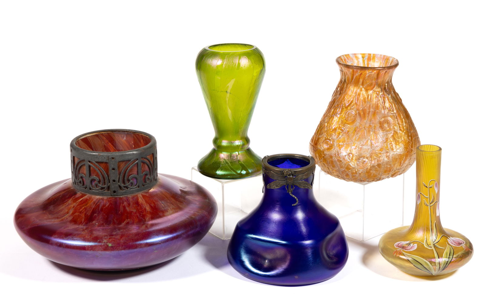 BOHEMIAN IRIDESCENT ART GLASS VASES, LOT OF FIVE: BOHEMIAN IRIDESCENT ART GLASS VASES, LOT OF FIVE, various colors, including a green Kralik Pampas, a blue iridescent example with metal dragonfly mount, and Loetz Marmoriete with a metal mount. Variou