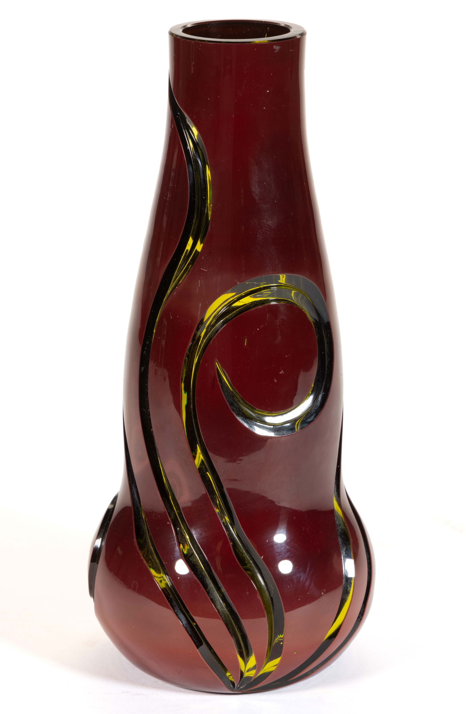 BOHEMIAN / CZECH ART NOUVEAU INTAGLIO CUT OVERLAY ART GLASS VASE: BOHEMIAN / CZECH ART NOUVEAU INTAGLIO CUT OVERLAY ART GLASS VASE, deep opaque red to olive green with deeply cut decoration of meandering vines over the gourd-form body, having a squat globu