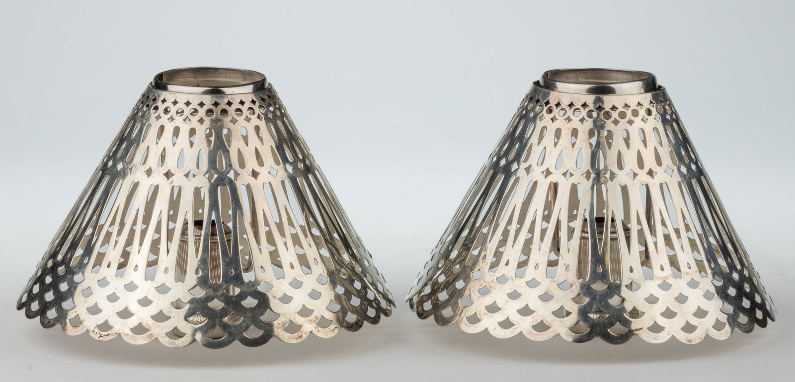 TIFFANY & CO. RETICULATED STERLING SILVER CANDLE LAMP SHADES WITH SILVER-PLATED SUPPORTS, PAIR (1 of 3)