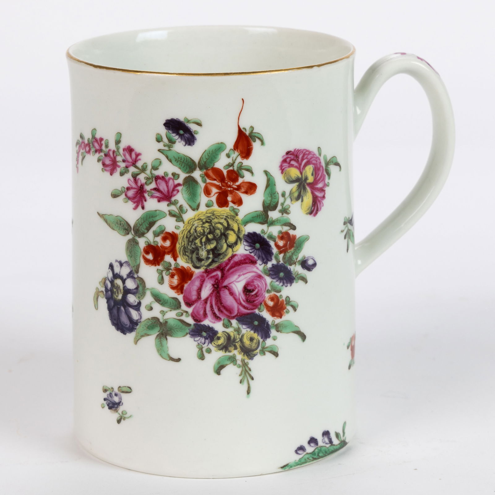 ENGLISH PORCELAIN HAND-PAINTED MUG: ENGLISH PORCELAIN HAND-PAINTED MUG, cylindrical form, featuring bold polychrome floral designs with scattered sprigs and gilt rim. Late 18th/early 19th century. 4 3/4" H, 3 1/2" D rim. 
