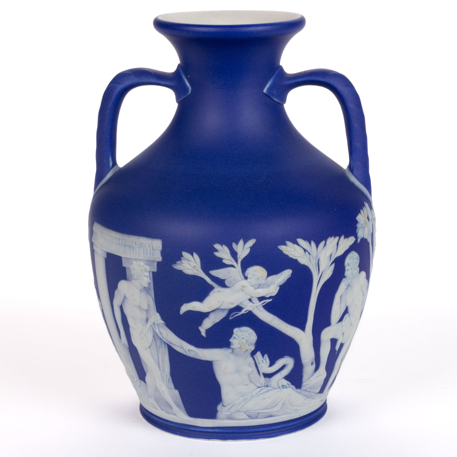 WEDGWOOD BLUE JASPERWARE PORTLAND VASE: WEDGWOOD BLUE JASPERWARE PORTLAND VASE, having dark blue ground with white sprig molded classical images of figures including cupid and masks to each handle. Impressed "WEDGWOOD" t