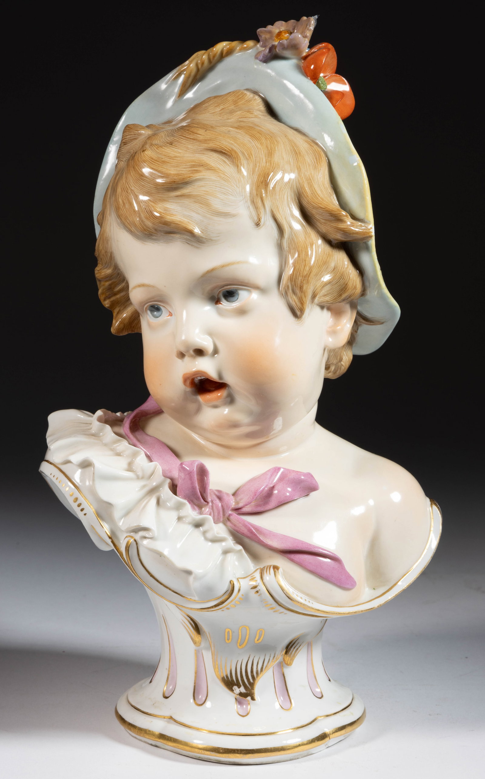 GERMAN MEISSEN PORCELAIN ALLEGORICAL SUMMER BUST: GERMAN MEISSEN PORCELAIN ALLEGORICAL SUMMER BUST, on a pedestal base, polychrome hand-painted depicting a child wearing a hat with flowers and a ribbon. Underglaze hand-brushed blue crossed sword