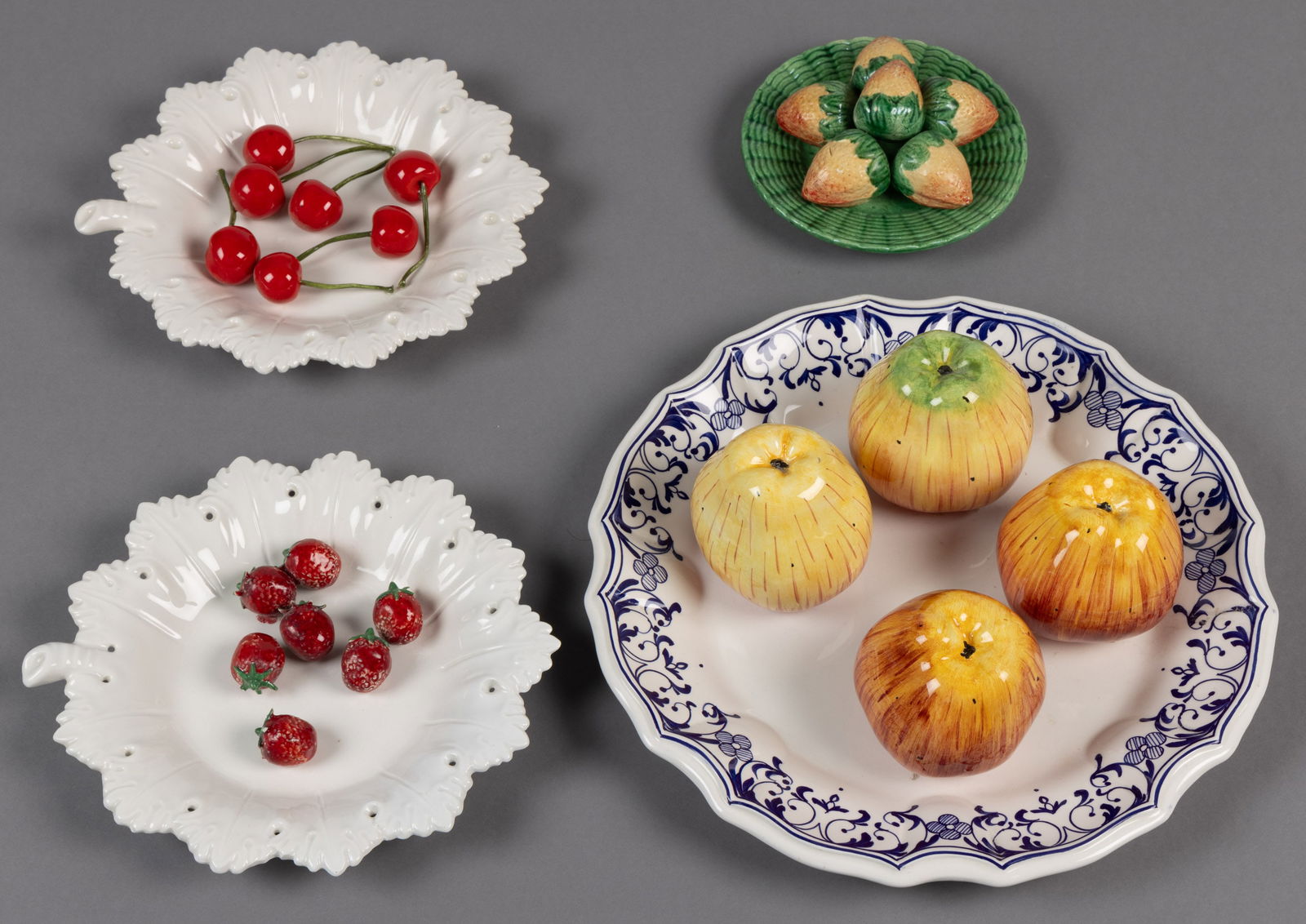 ITALIAN AND PORTUGUESE TROMPE L'OEIL HAND-PAINTED CERAMIC FIGURAL FRUIT PLATES, LOT OF FOUR (1 of 1)