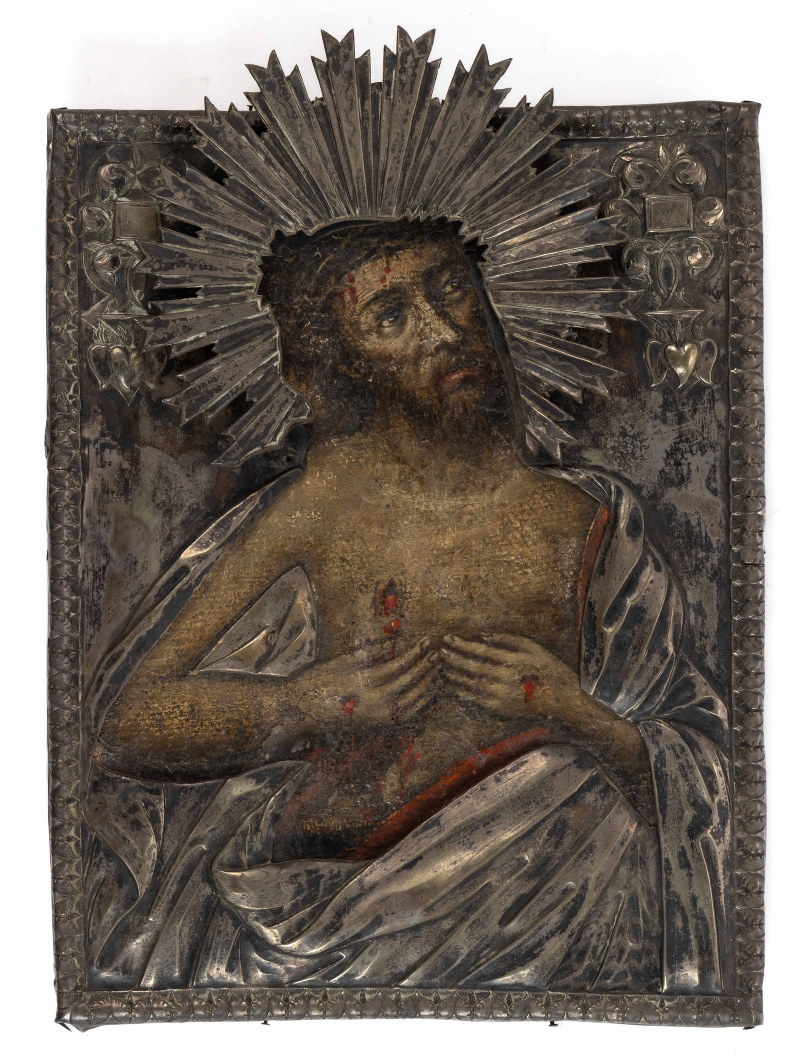 RUSSIAN ORTHODOX ICON: RUSSIAN ORTHODOX ICON, punched and repousse-decorated riza framing the painted canvas laid to wooden surface depicting Jesus Christ after the crucifixion with a chest wound from the holy lance, w